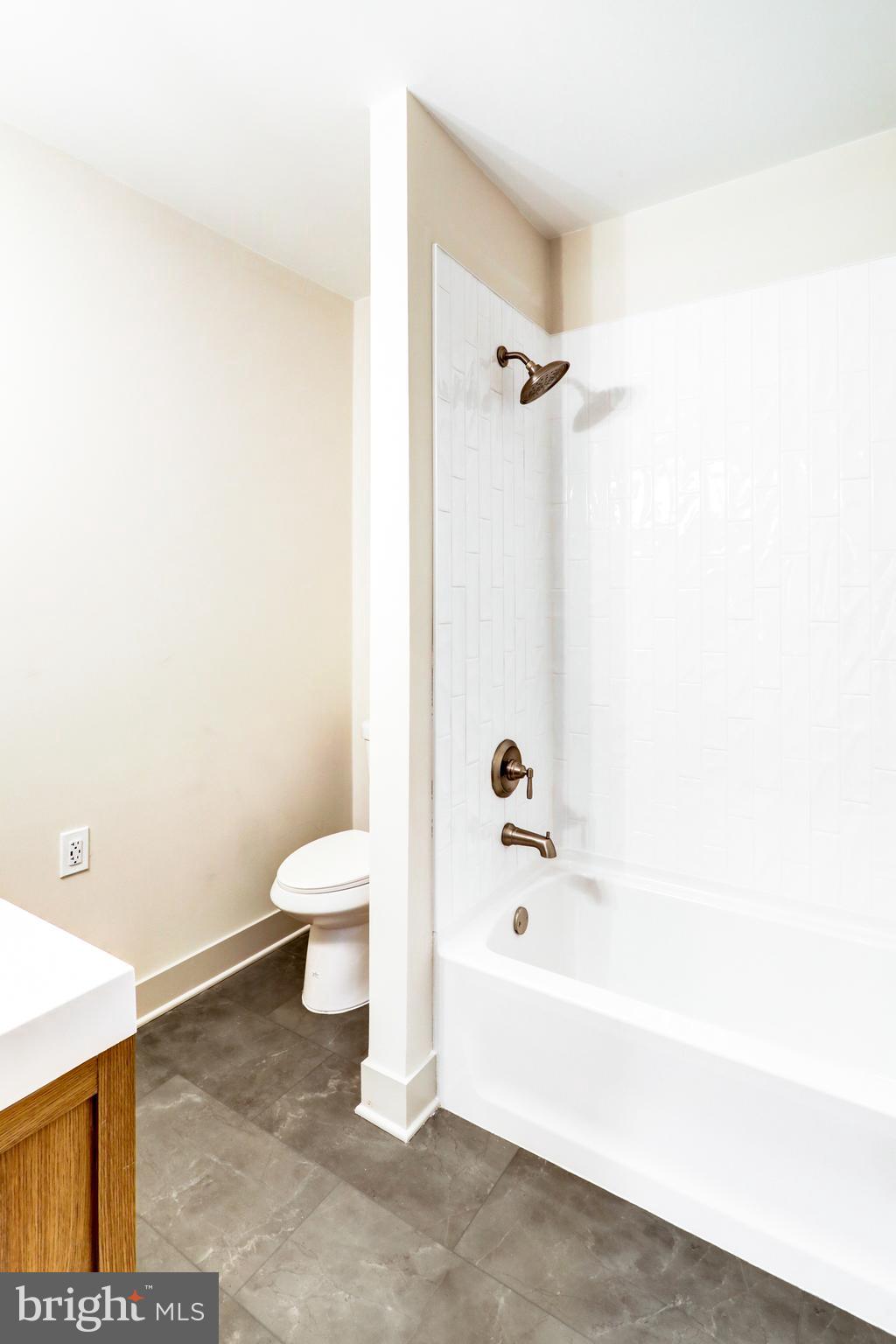 206 Moulstown Road Abbottstown, PA 17301 - Photo 20 of 30 a bathroom with a bathtub and toilet