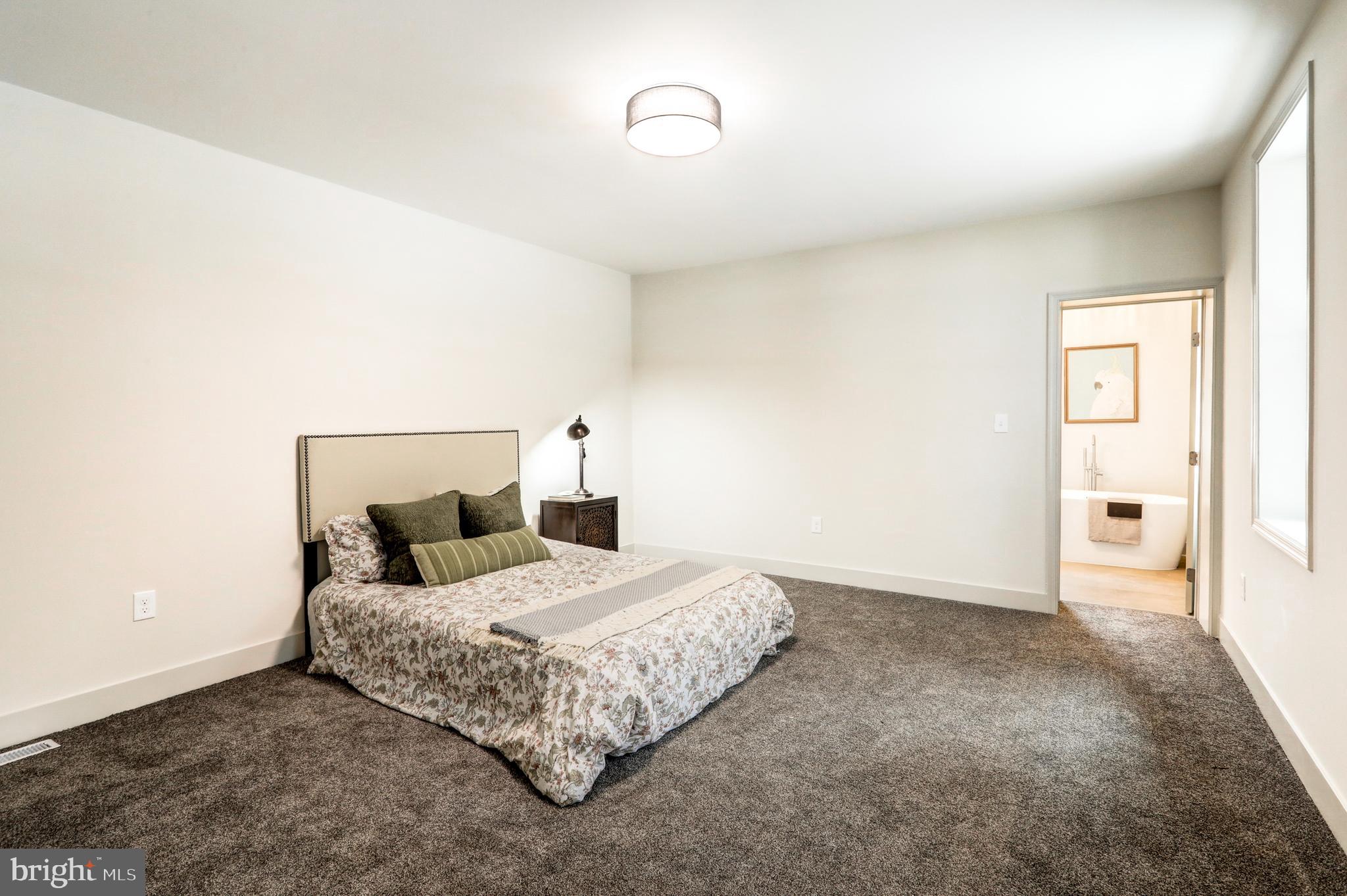 206 Moulstown Road Abbottstown, PA 17301 - Photo 23 of 30 a bedroom with a bed and a window