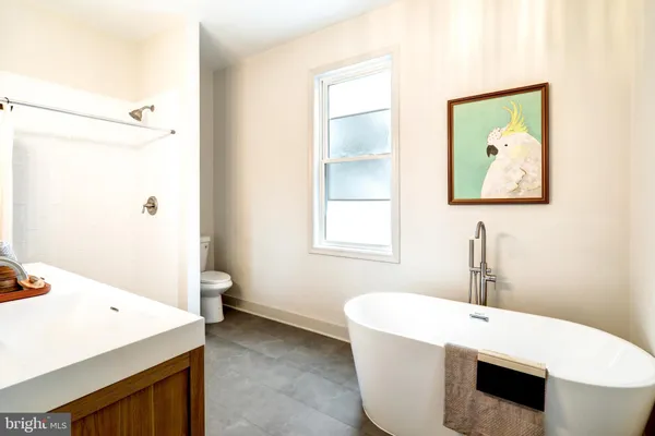 a bathroom with a sink and a bathtub