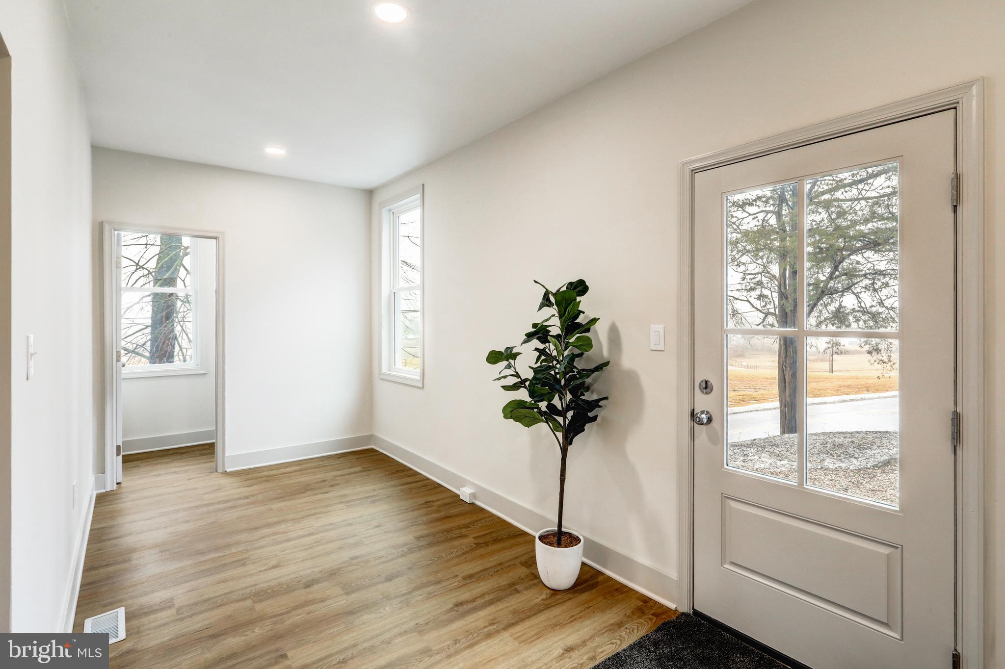 206 Moulstown Road Abbottstown, PA 17301 - Photo 4 of 30 a view of entryway with window and wooden floor