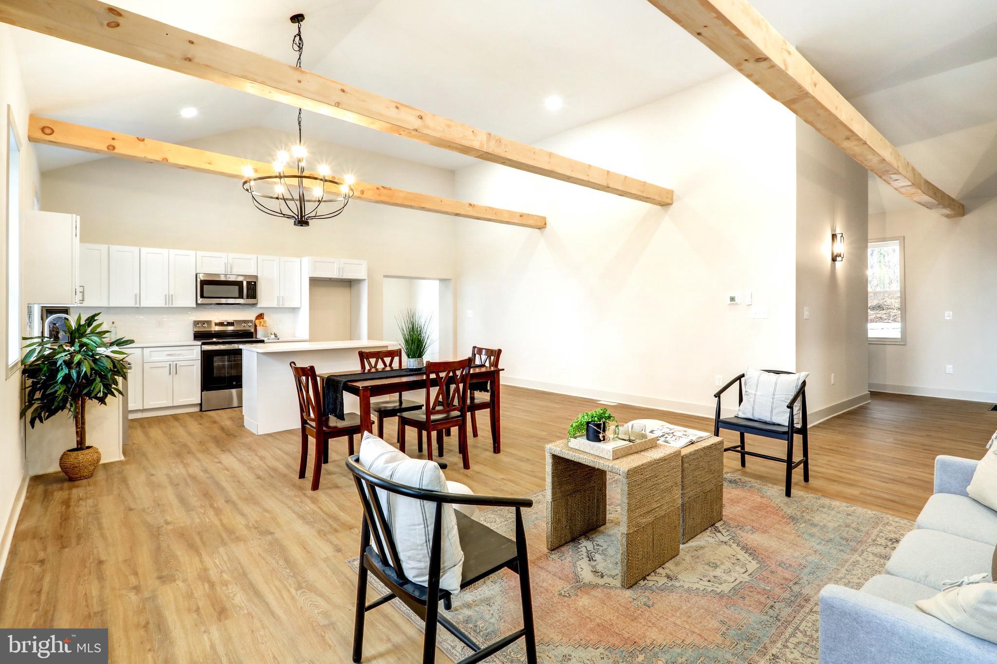 206 Moulstown Road Abbottstown, PA 17301 - Photo 7 of 30 a view of a dining room with furniture and wooden floor