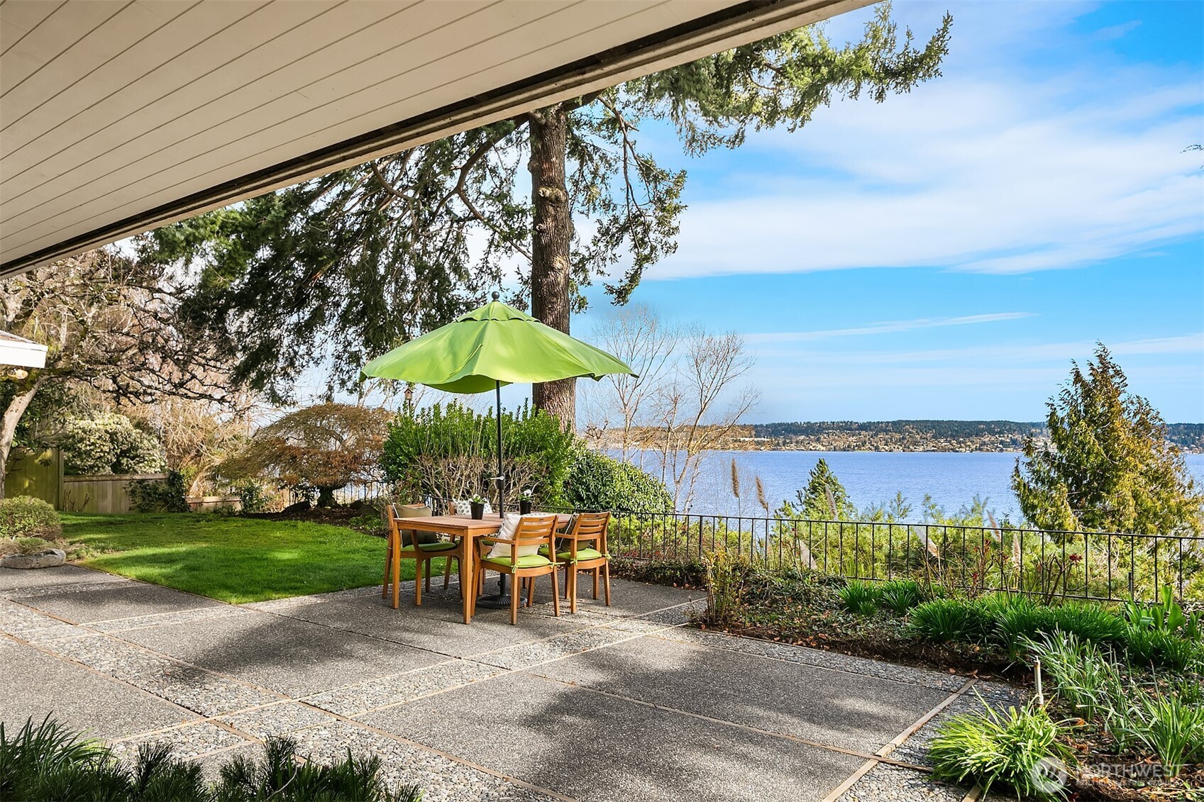 6555 Northeast Windermere Road Seattle, WA 98105 - Photo 33 of 40 a view of a chairs and table in backyard of the house