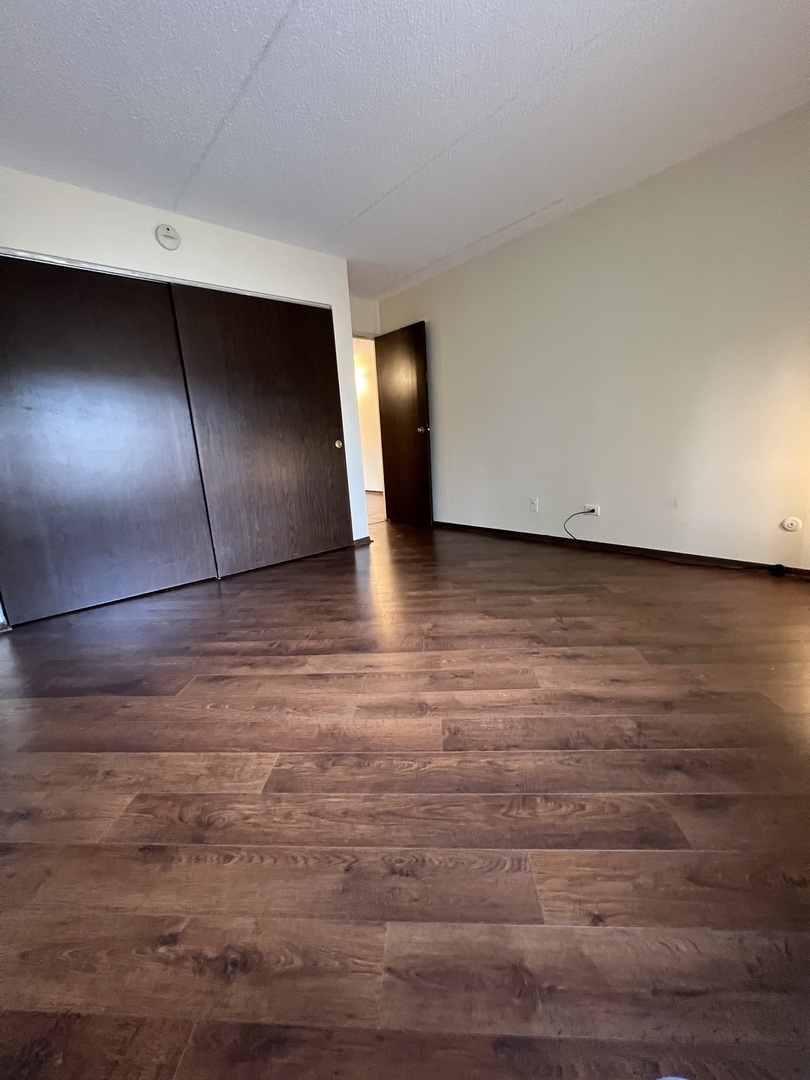 835 Pearson Street, Unit 209 Des Plaines, IL 60016 - Photo 7 of 10 a view of an empty room