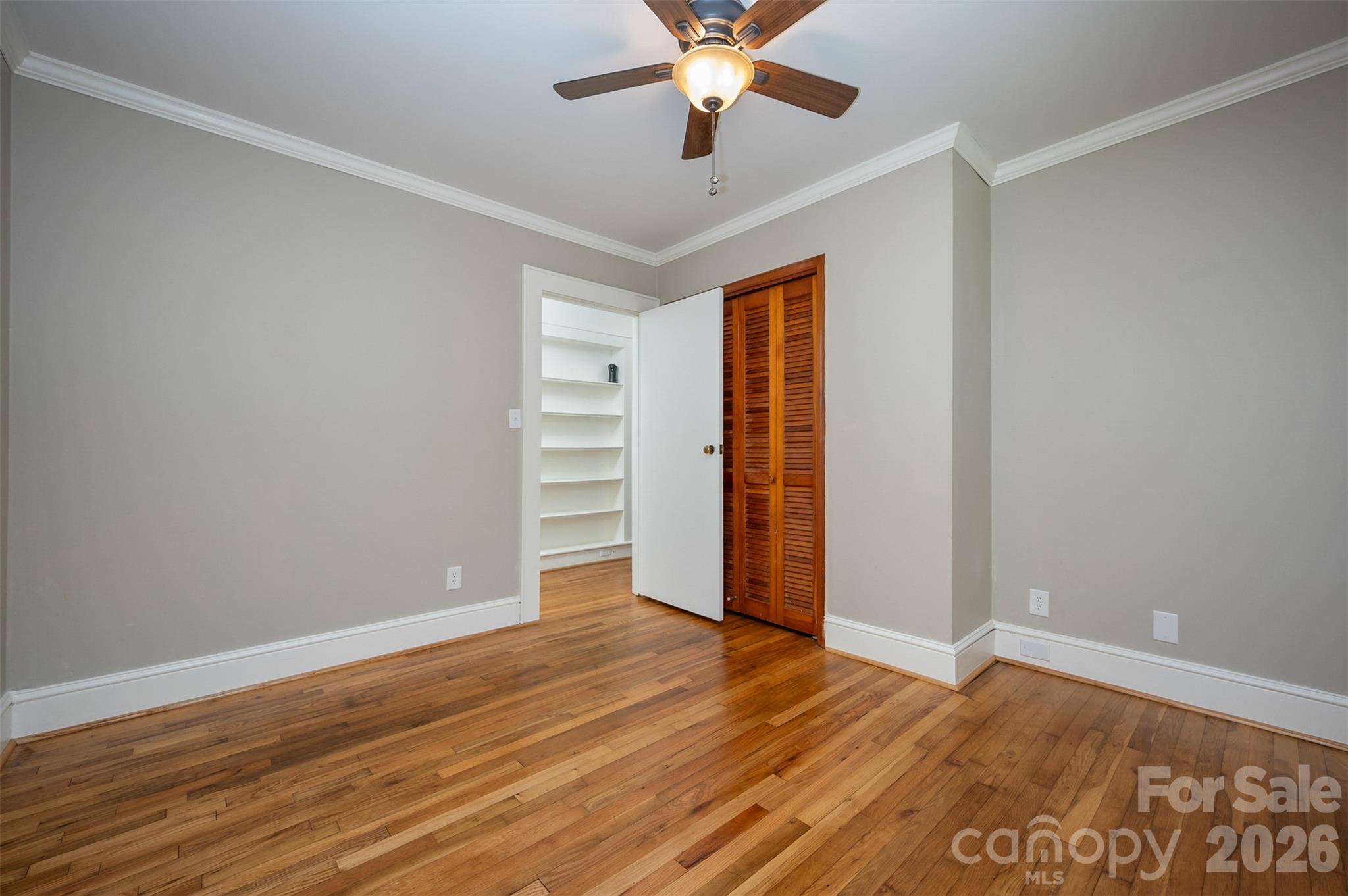 351 Waters Road Bostic, NC 28018 - Photo 15 of 35 a view of a room with wooden floor and ceiling fan