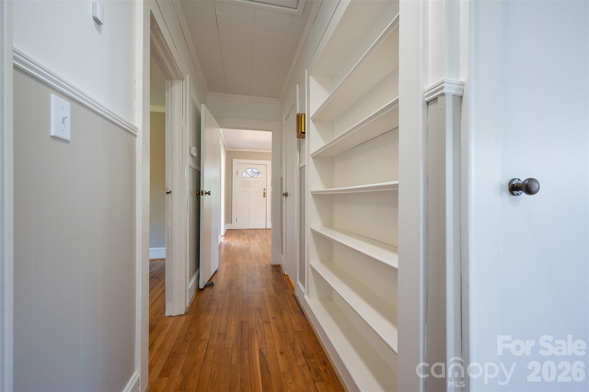 351 Waters Road Bostic, NC 28018 - Photo 18 of 35 a view of a hallway with wooden floor and staircase