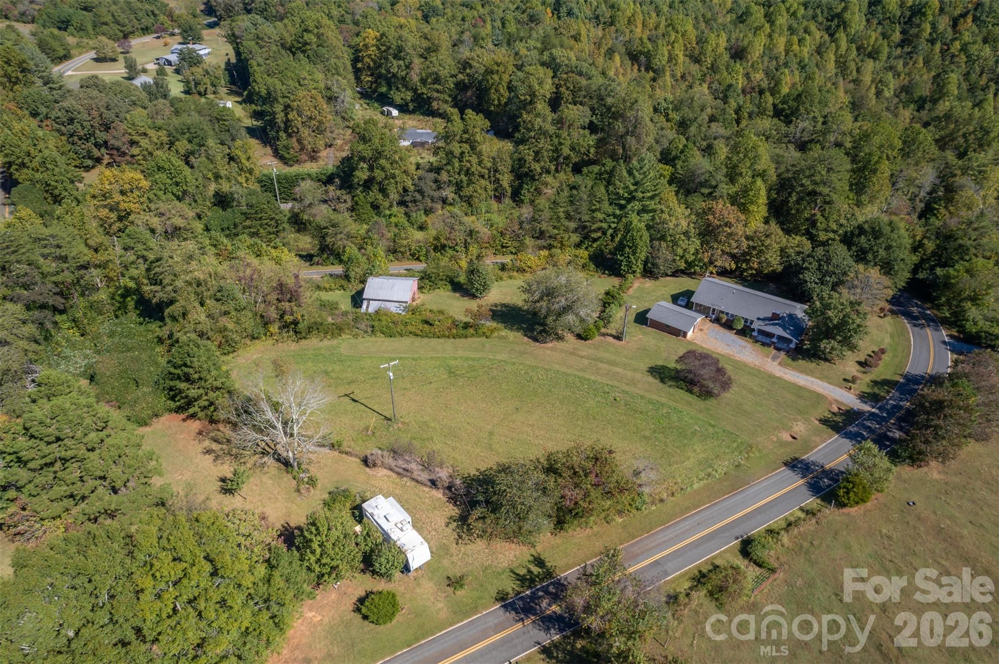 351 Waters Road Bostic, NC 28018 - Photo 32 of 35 an aerial view of a house with a yard
