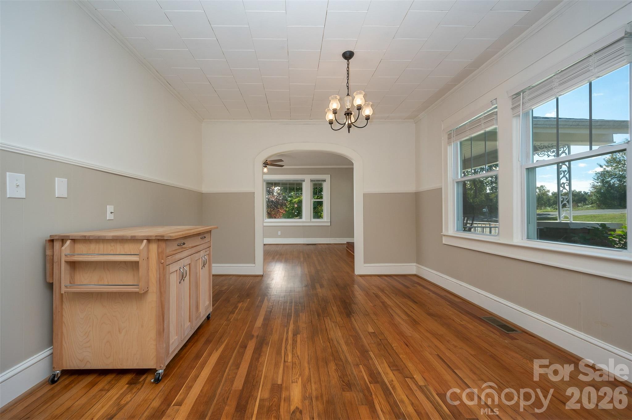 351 Waters Road Bostic, NC 28018 - Photo 7 of 35 a view of empty room with wooden floor and cabinet