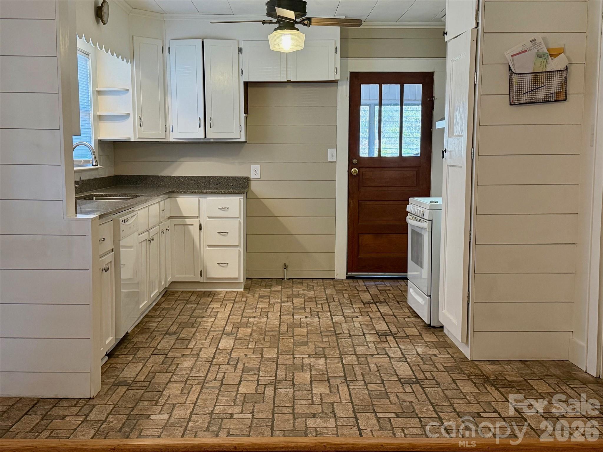 351 Waters Road Bostic, NC 28018 - Photo 9 of 35 a view of a hallway with wooden cabinets