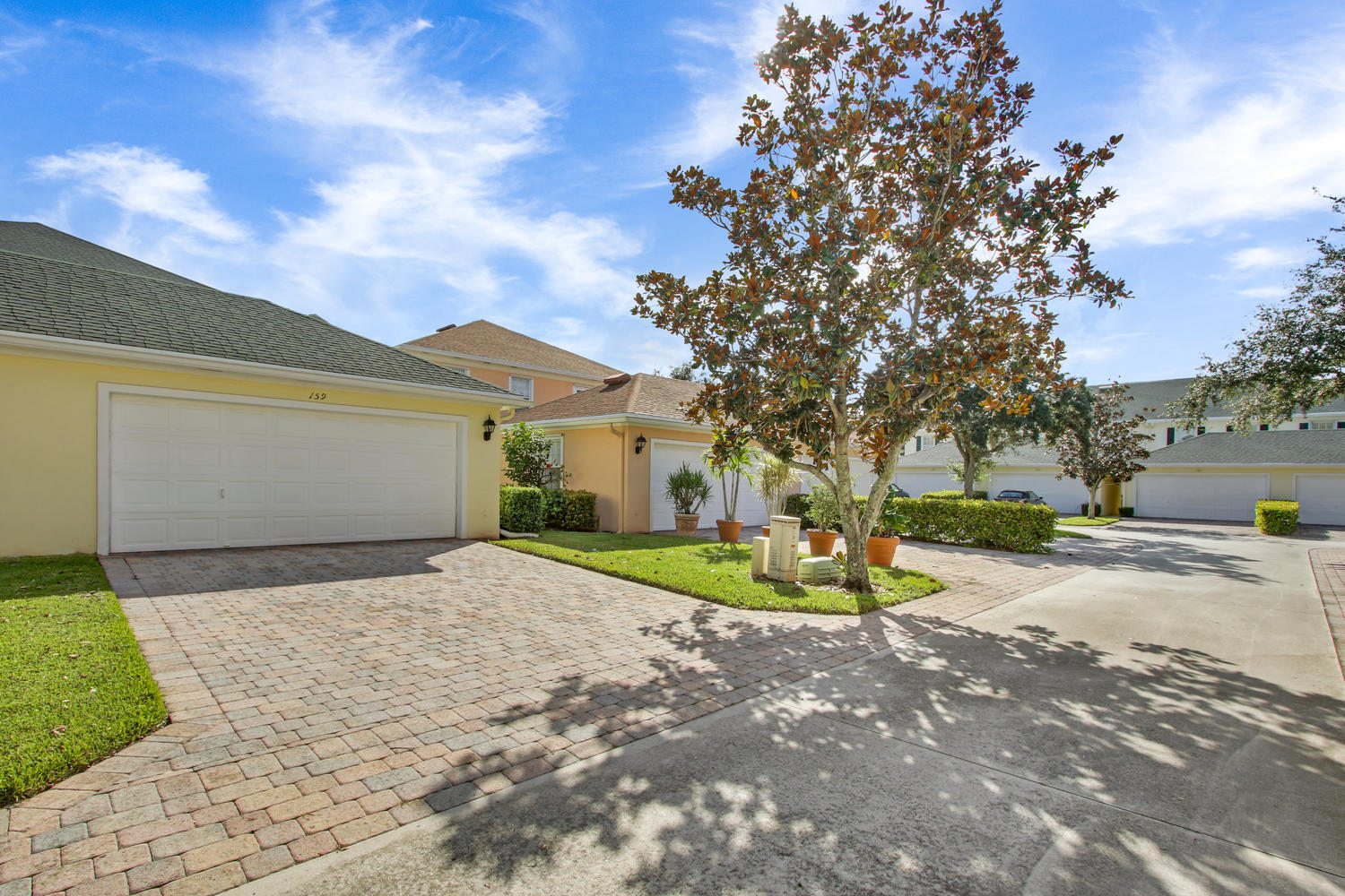 159 Promenade Way Jupiter, FL 33458 - Photo 22 of 24 Alley Driveway/Garage
