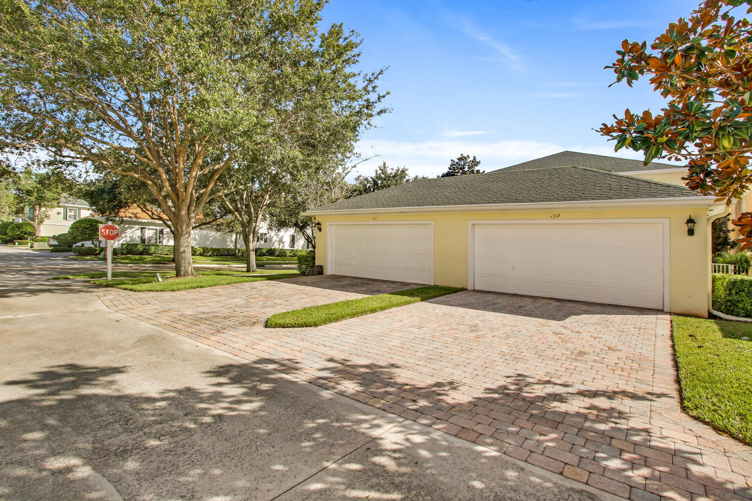 159 Promenade Way Jupiter, FL 33458 - Photo 23 of 24 Driveway and Garage