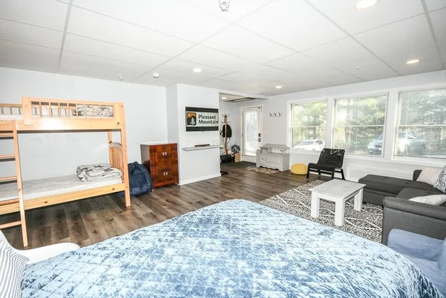 a living room with furniture window and a table