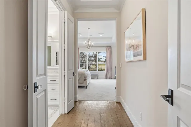 a view of a bedroom from a hallway