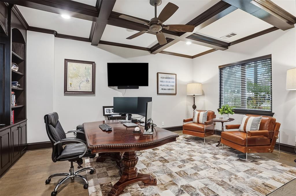 6714 Williamson Road Dallas, TX 75214 - Photo 6 of 40 a living room with furniture a flat screen tv and a window