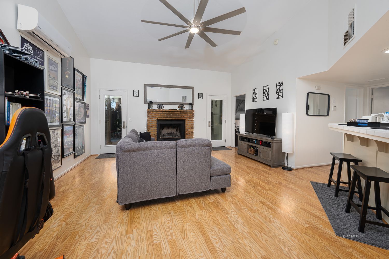 218 Washington Way Ridgecrest, CA 93555 - Photo 8 of 34 a living room with furniture and a flat screen tv