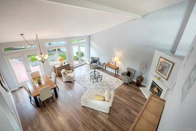 a white toilet sitting next to a bathroom sink
