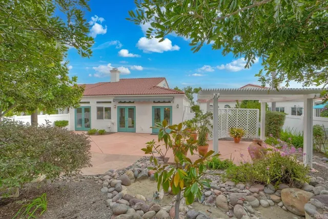 a view of a house with swimming pool