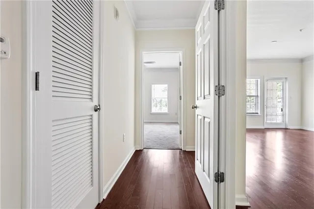 a view of gallery with wooden floor