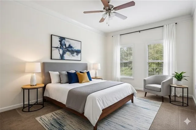 a bedroom with bed and a window