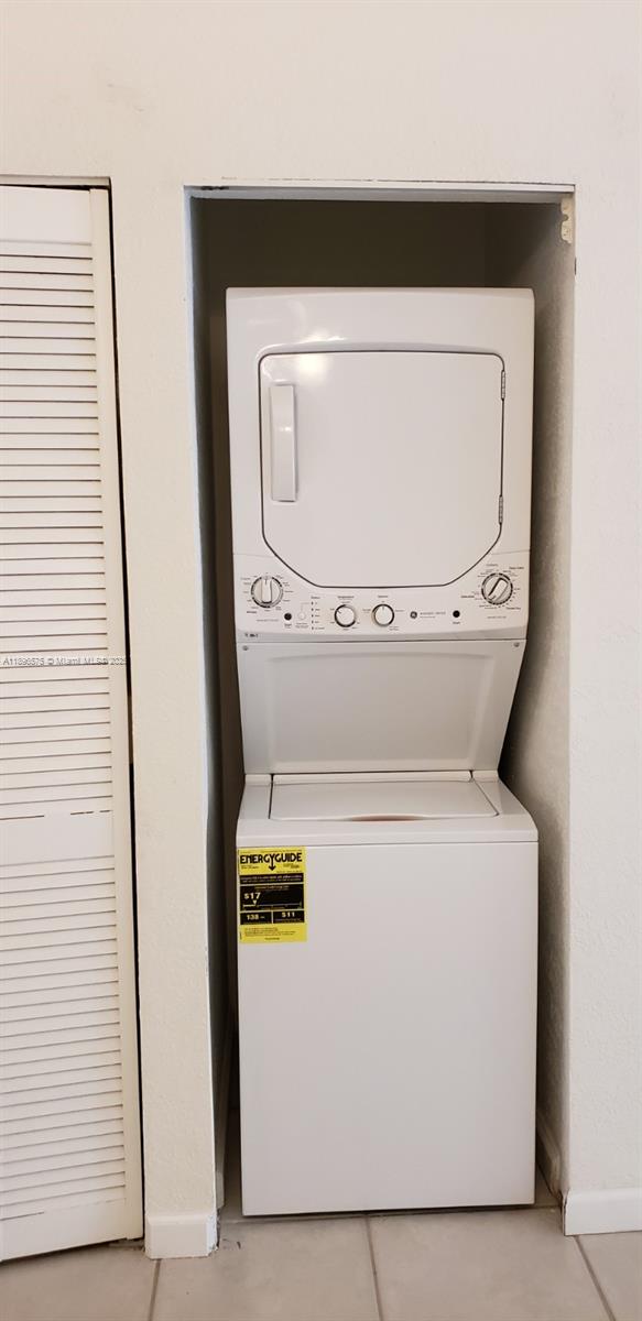 4950 Washington Street, Unit 5 Hollywood, FL 33021 - Photo 14 of 19 a utility room with dryer and washer