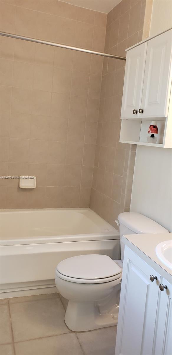 4950 Washington Street, Unit 5 Hollywood, FL 33021 - Photo 18 of 19 a bathroom with a toilet and a shower