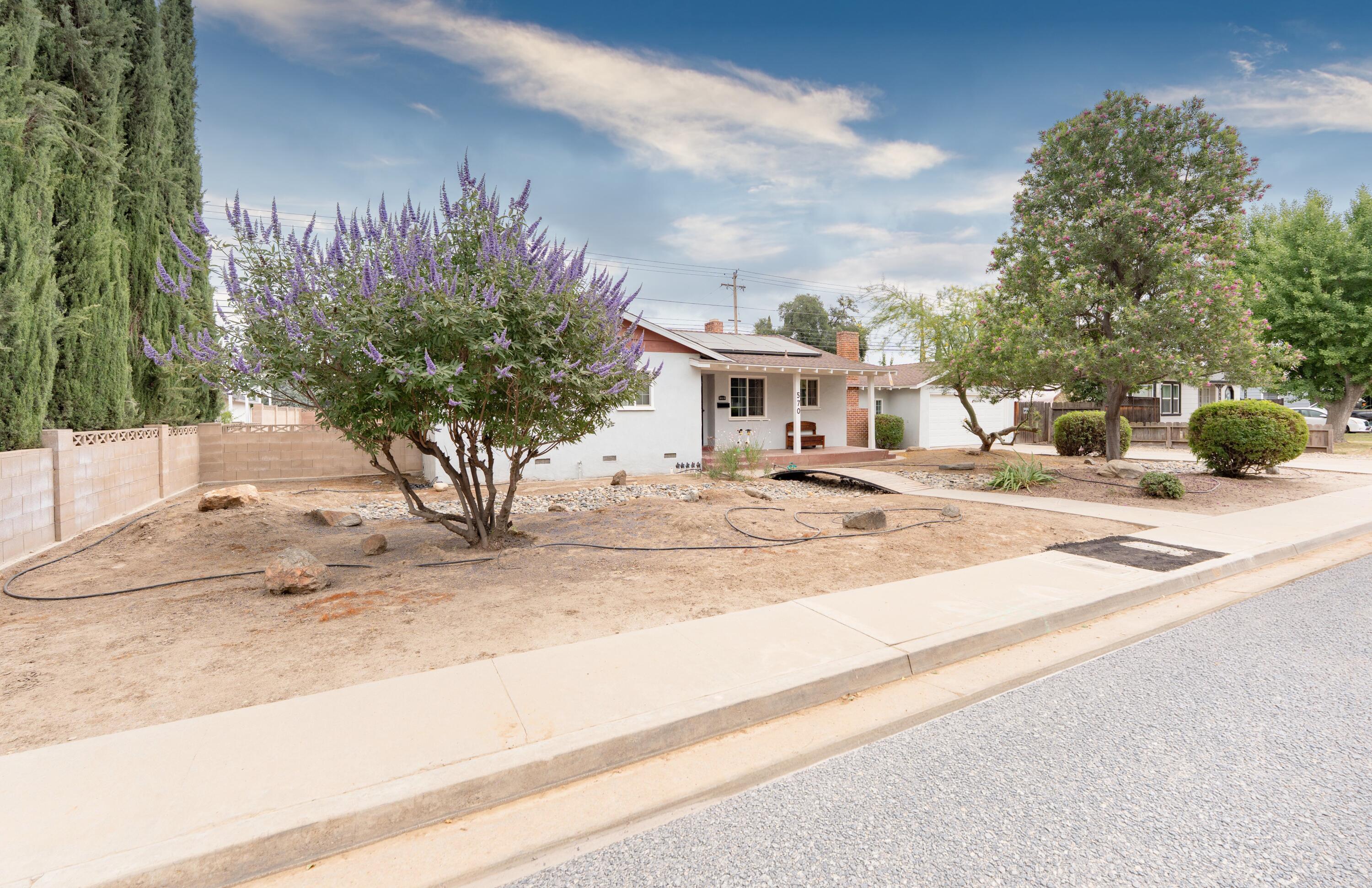 570 North Birch Avenue Reedley, CA 93654 - Photo 2 of 52 a view of a house with a snow on a road