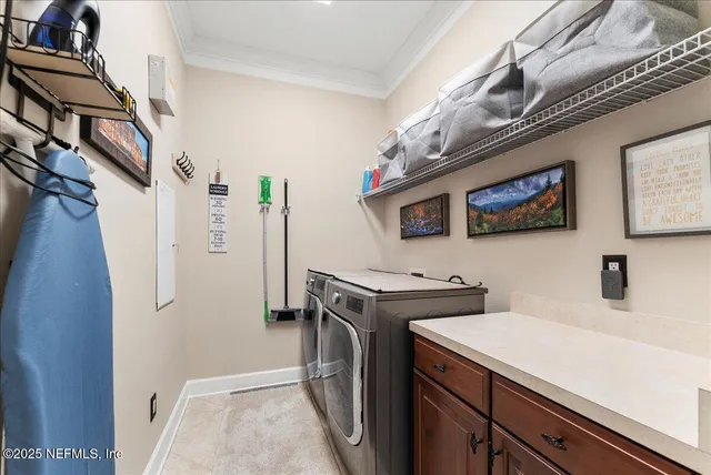 a bedroom with a bed couch and a large window