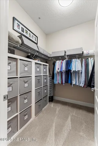 a view of a workspace with furniture