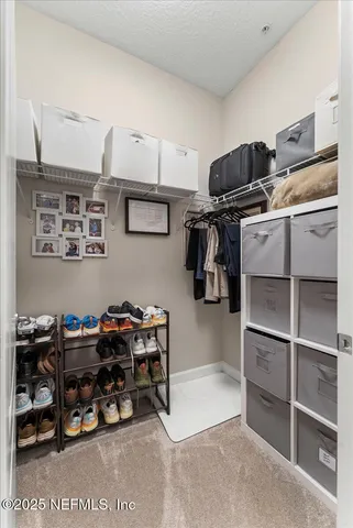 a bathroom with a double vanity sink mirror double and shower