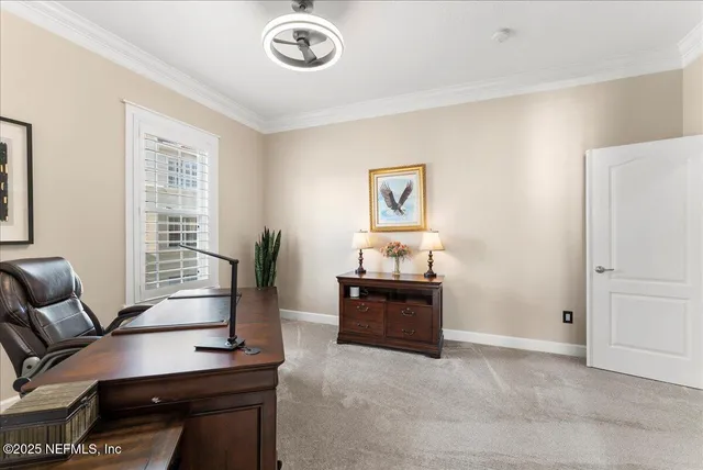 a workspace with furniture and window