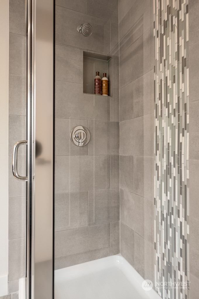 24 178th Place Southwest, Unit IW 64 Bothell, WA 98012 - Photo 23 of 32 a bathroom with a shower