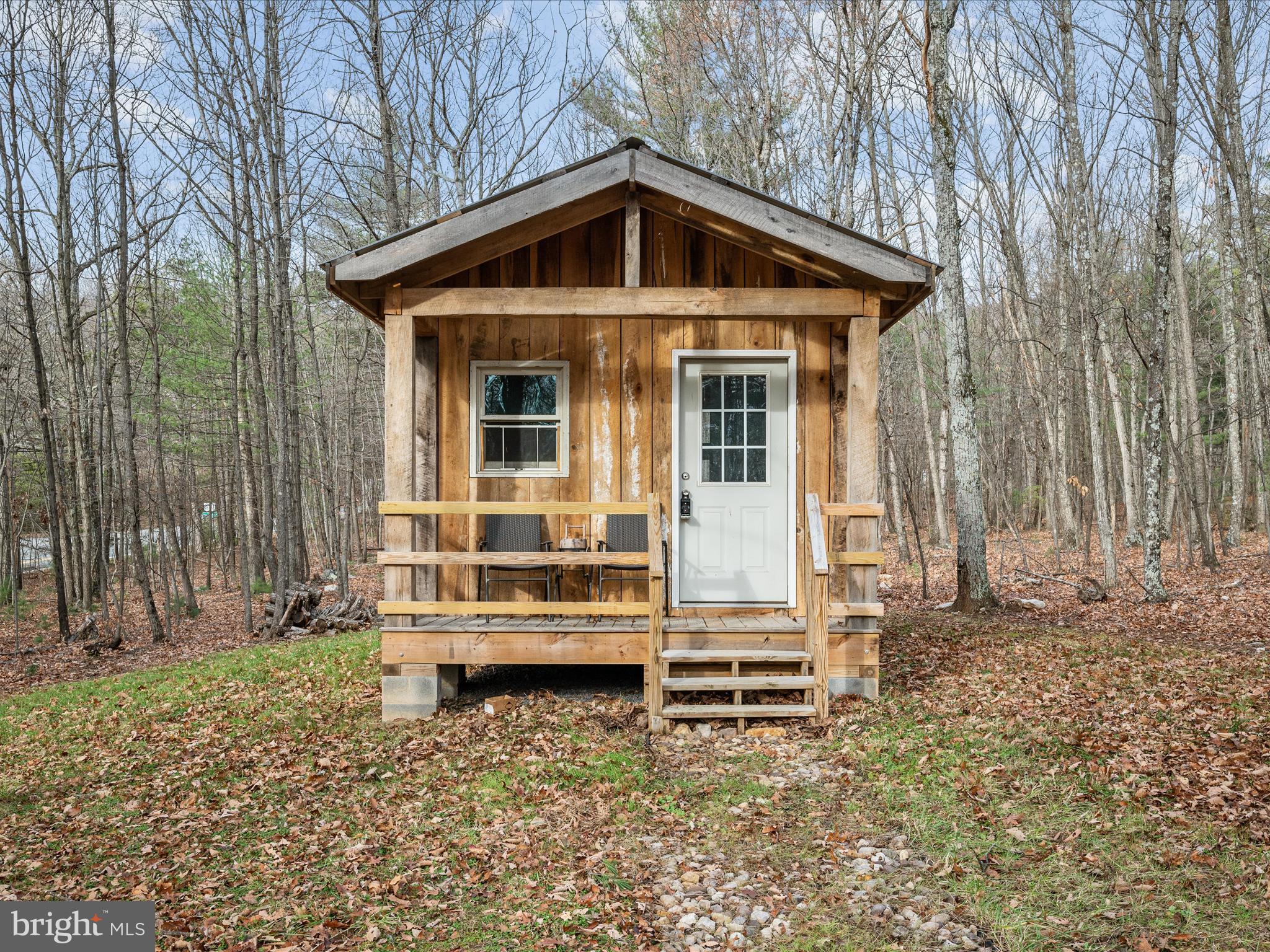 0 Bushy Ridge Drive Star Tannery, VA 22654 - Photo 2 of 12 a front view of a house with a yard