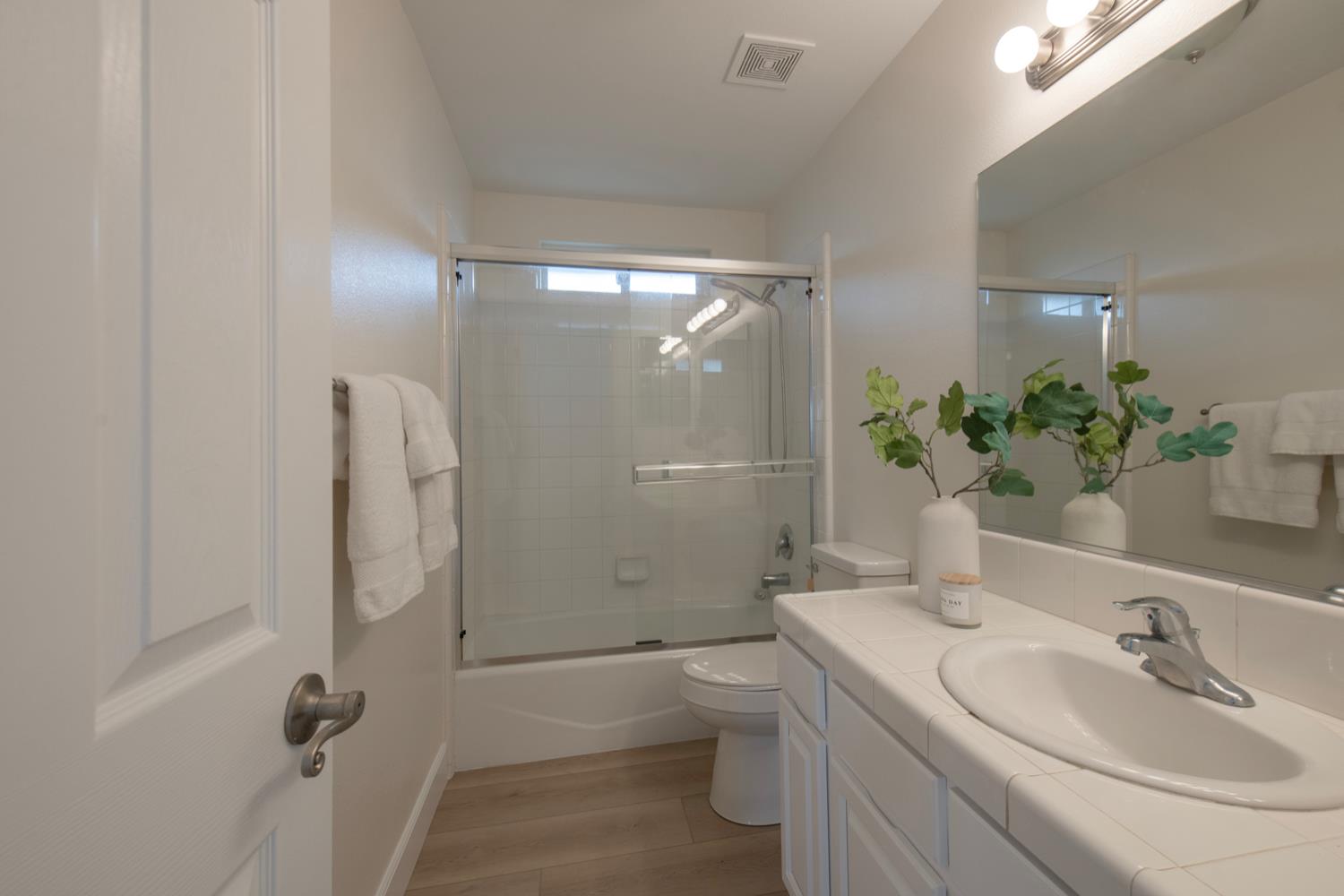 440 Pine Street Parlier, CA 93648 - Photo 16 of 27 a bathroom with a sink toilet and shower