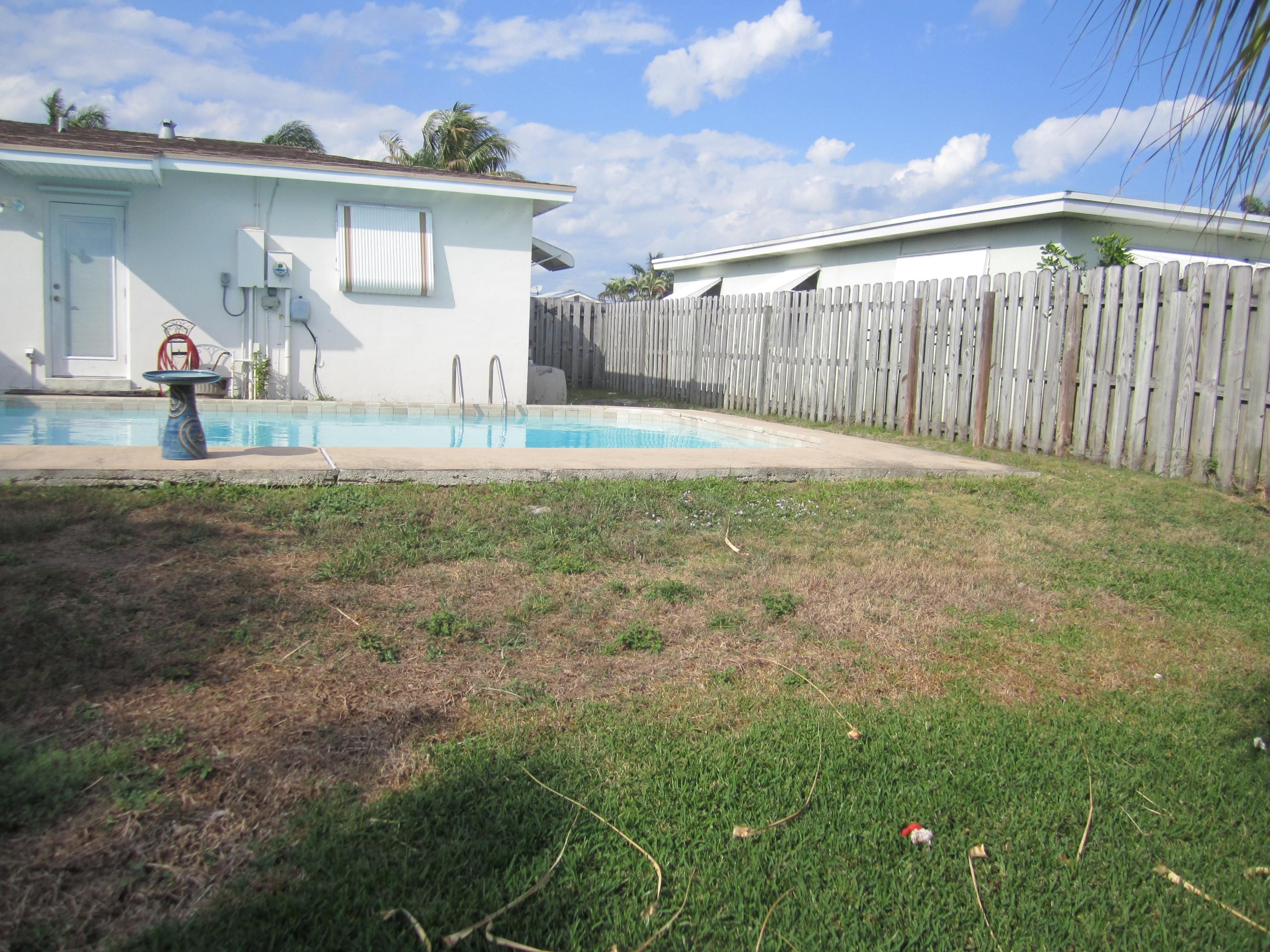 345 East Lake Road Palm Springs, FL 33461 - Photo 6 of 17 Rear View
