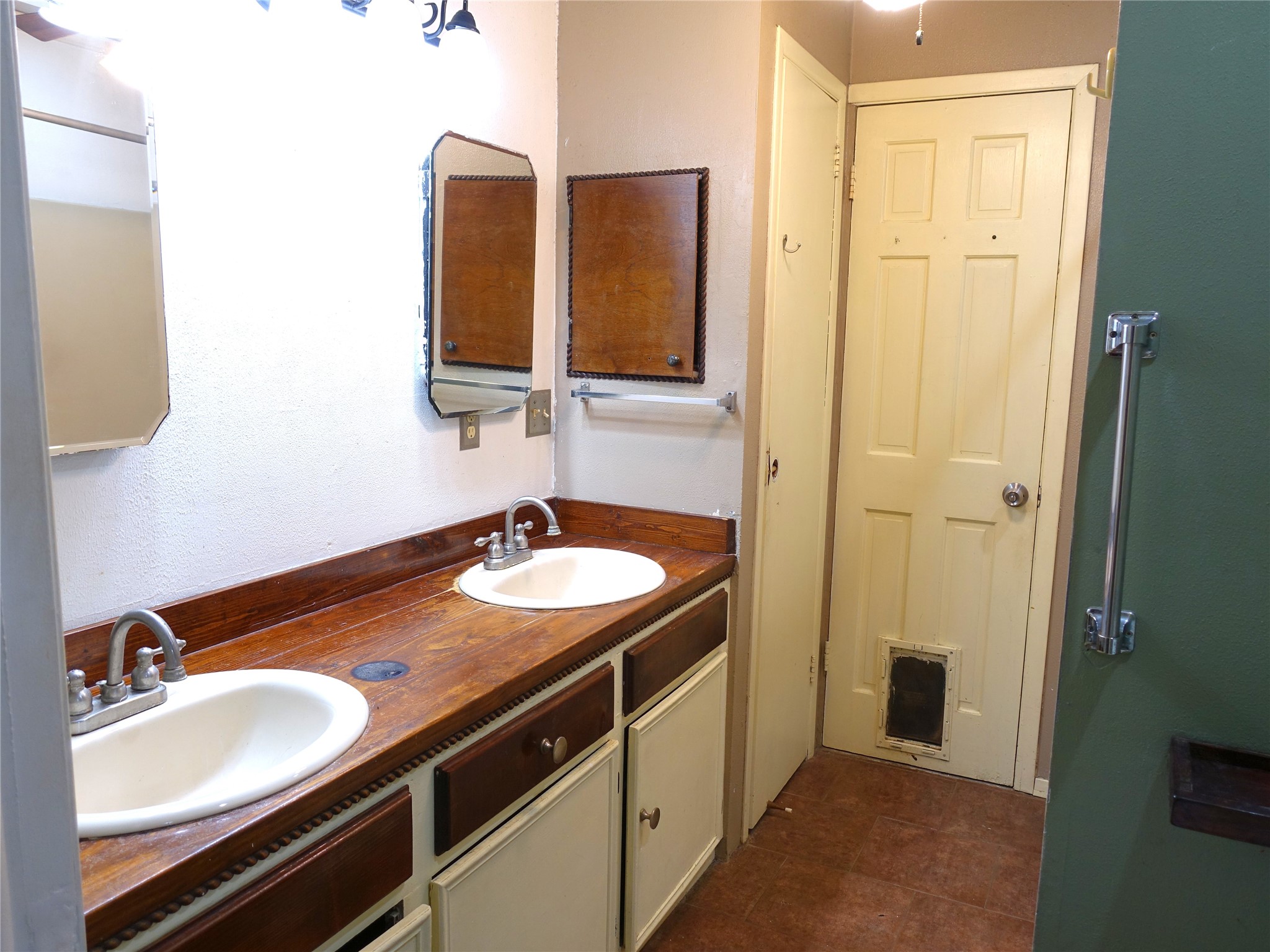 20 Hideaway Trail Coldspring, TX 77331 - Photo 17 of 24 a bathroom with a sink and a mirror
