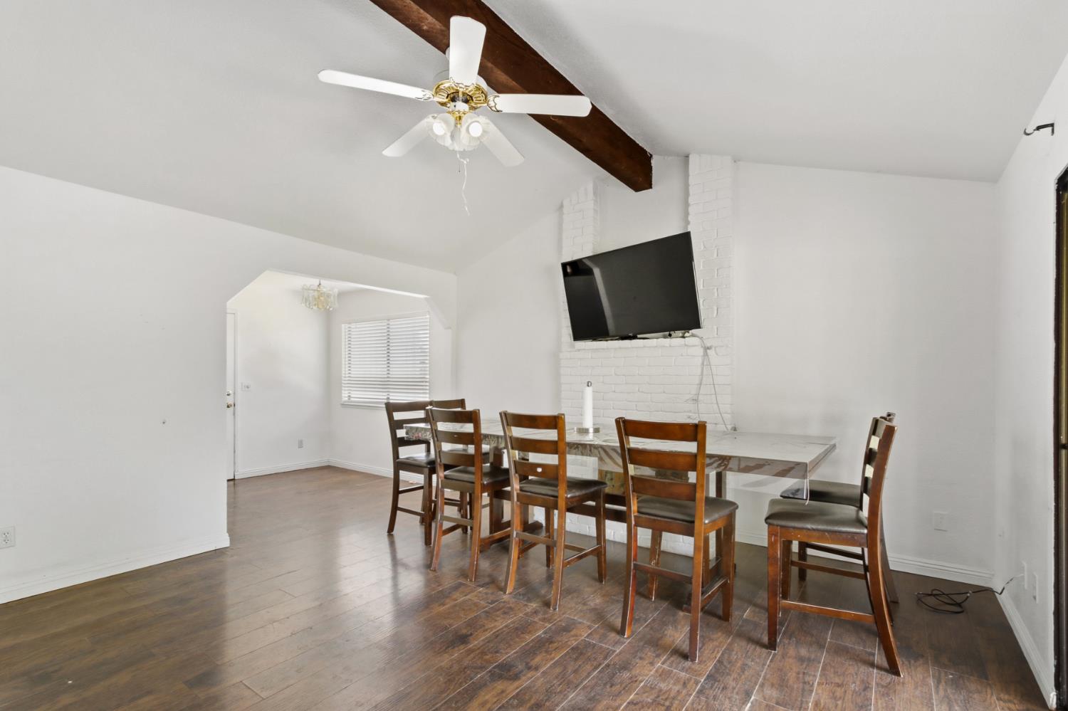 7208 7th Street Rio Linda, CA 95673 - Photo 7 of 41 a view of a dining room with furniture and wooden floor