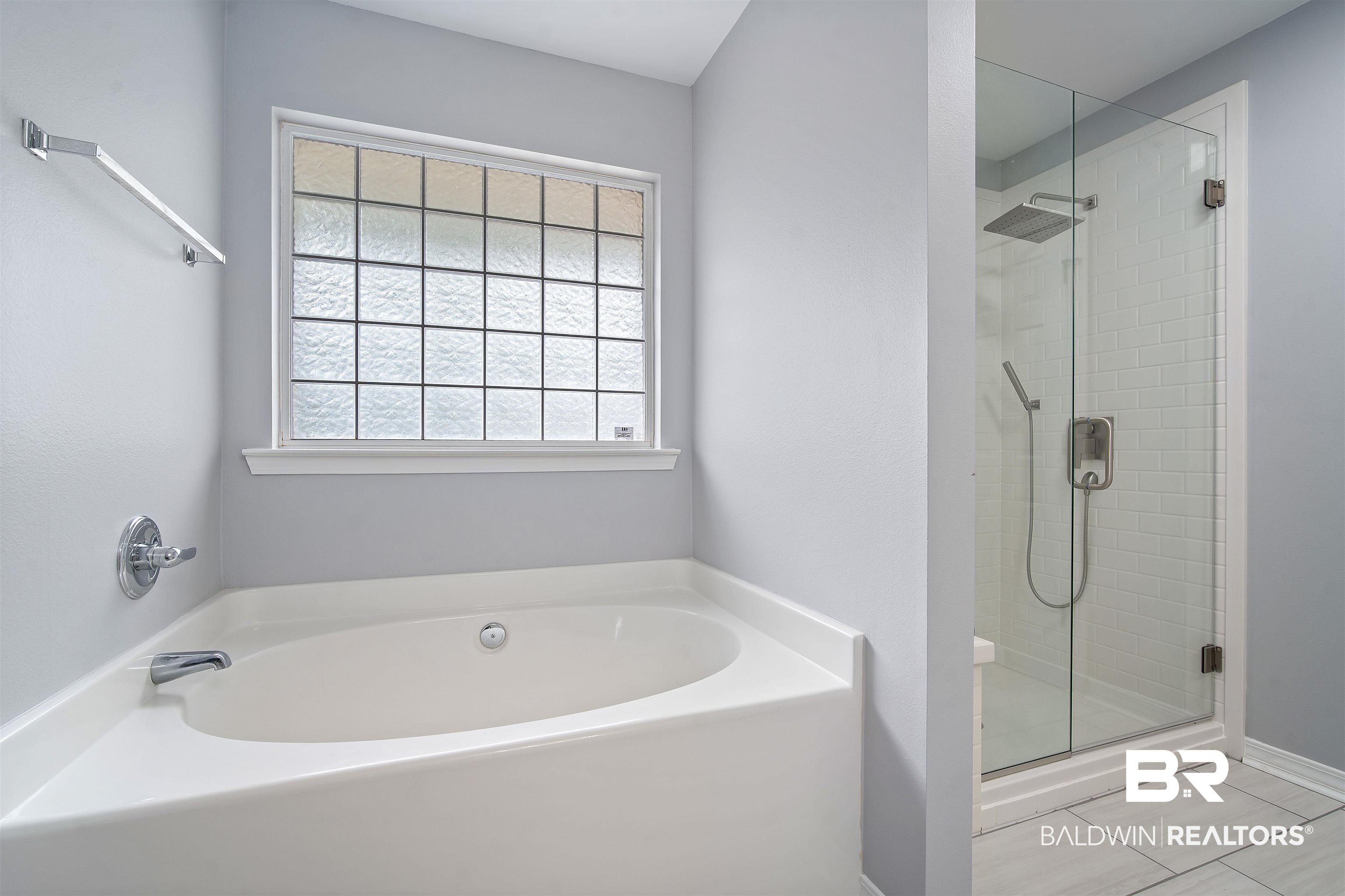 10713 Rigby Drive Mobile, AL 36695 - Photo 18 of 35 Full bathroom with a garden tub, a shower stall, and light tile patterned floors