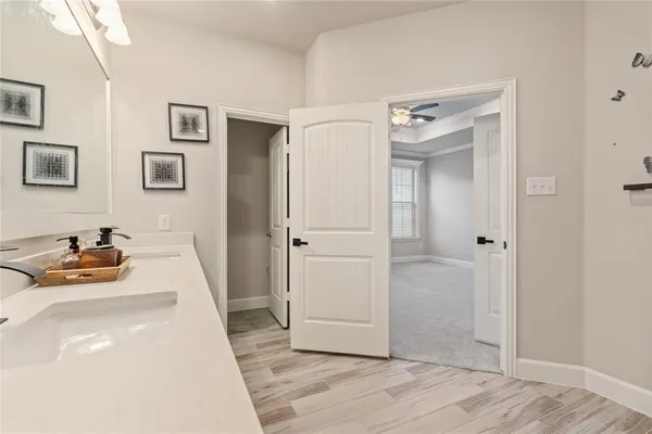 a bedroom with a bed and a cabinets