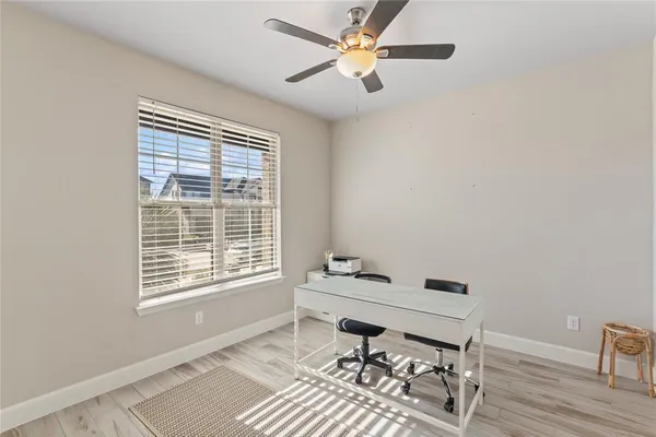 a workspace with wooden floor