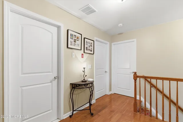 a view of a hallway with workspace