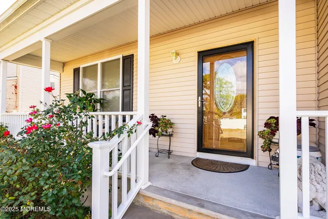 a front view of a house with a porch