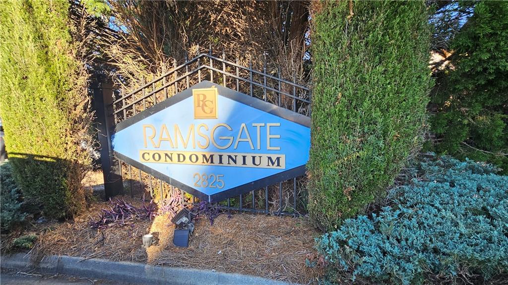 2825 Northeast Expressway, Unit E2 Atlanta, GA 30345 - Photo 11 of 15 a sign on a pole on a street