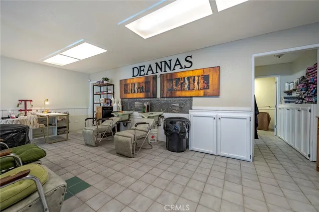 a kitchen with a cabinets and a stove top oven