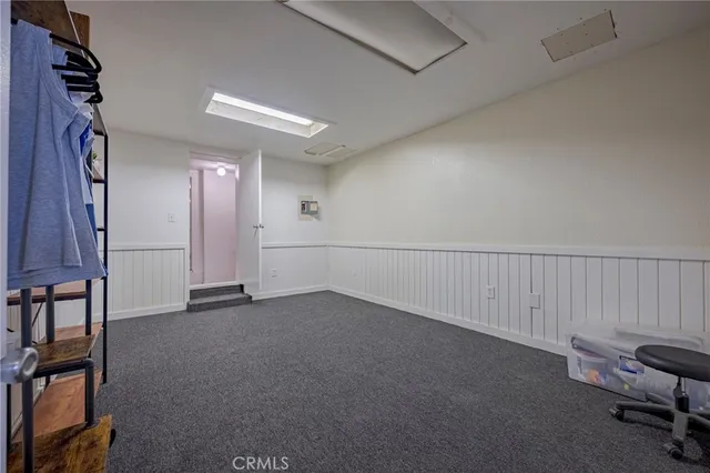 an empty room with staircase