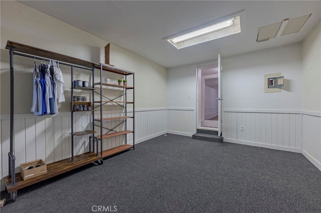 9387 Broadway Planada, CA 95365 - Photo 22 of 31 an empty room with staircase