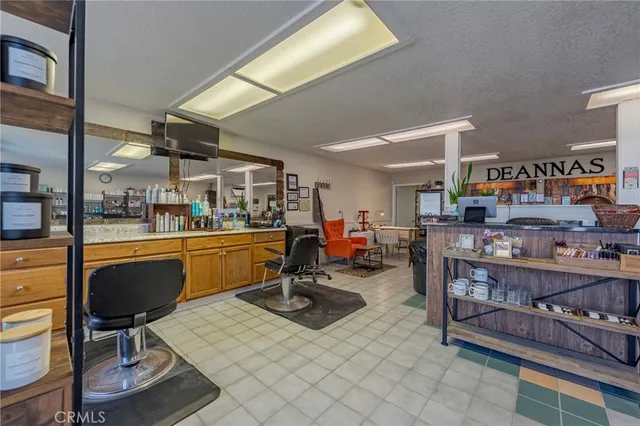 a view of a workspace with furniture