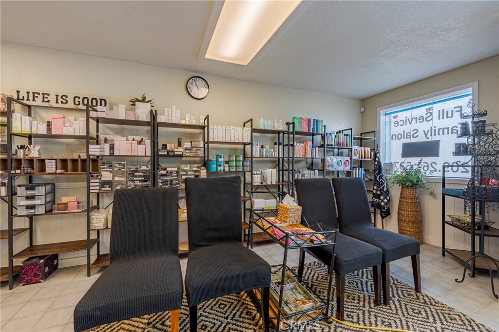 9387 Broadway Planada, CA 95365 - Photo 5 of 31 a view of a workspace with furniture