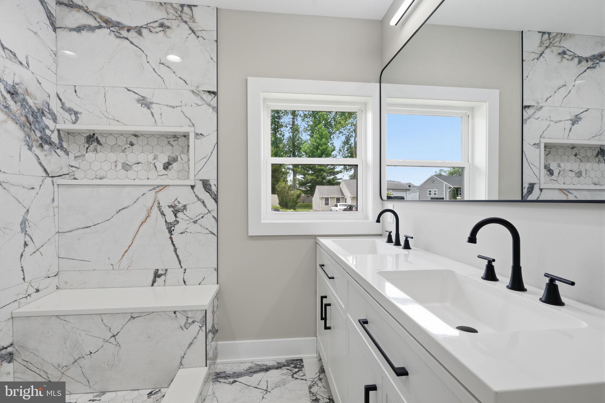 349 Andover Road Fairless Hills, PA 19030 - Photo 12 of 43 Elegant marble bath with natural light.