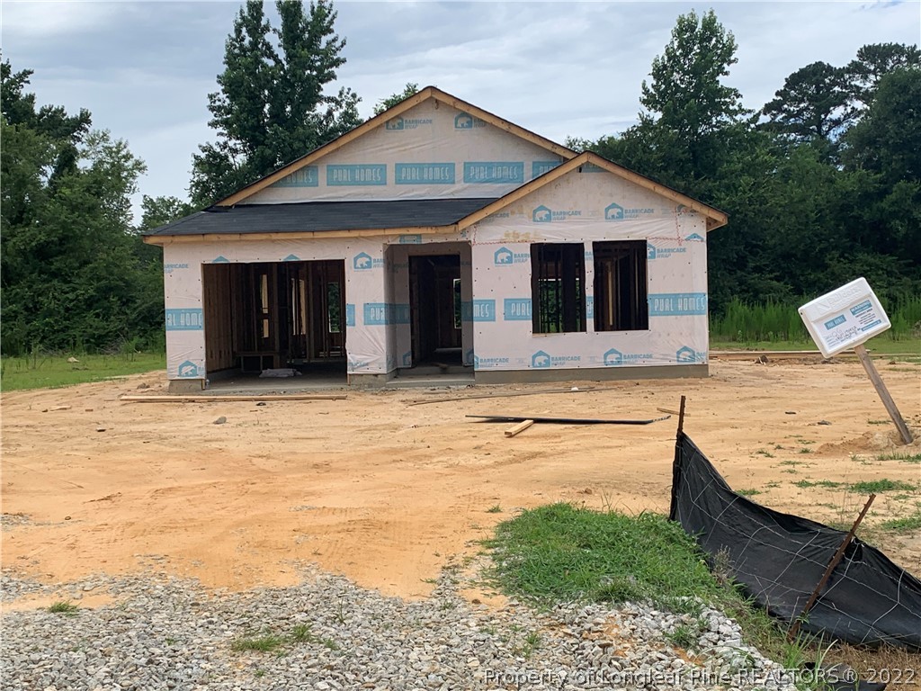 5930 Lowgrass Road Stedman, NC 28391 - Photo 1 of 1 a front view of a house with a yard