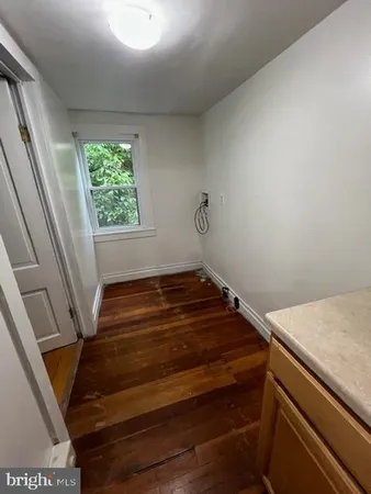 a room with a bed and a window