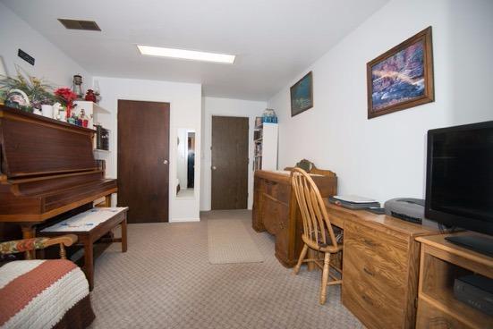 6681 Domino Road Central Point, OR 97502 - Photo 15 of 17 a room with furniture and a flat screen tv